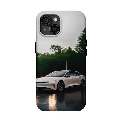 Lucid Air White Sedan Rainy City Street