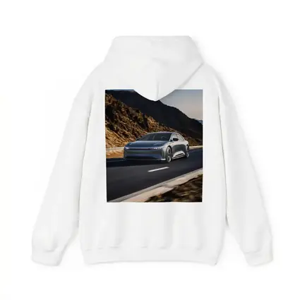 Lucid Air Speeding Through Rocky Mountain Road