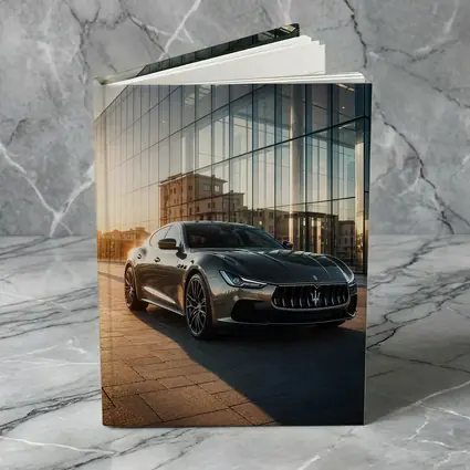 Maserati Ghibli Gray Glass Building Sunset