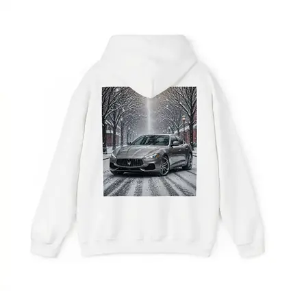Maserati Quattroporte Driving Through Snowy Street