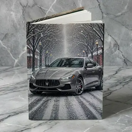 Maserati Quattroporte Driving Through Snowy Street