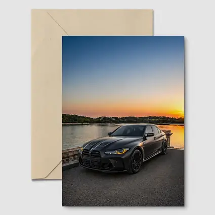 Matte Black BMW M3 Sedan Sunset Waterfront