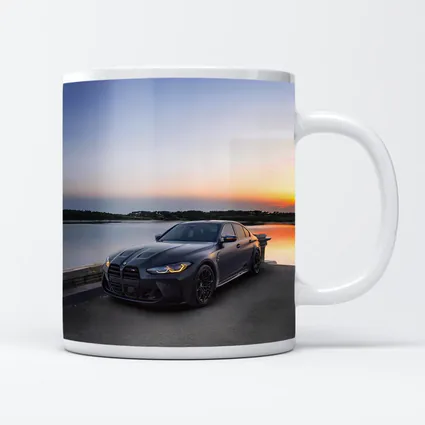Matte Black BMW M3 Parked By Lake Sunset