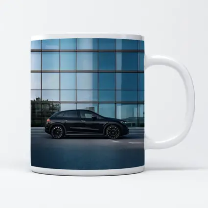 Black Mercedes EQE SUV Glass Building