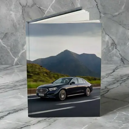 Mercedes E-Class Driving Through Mountain Road