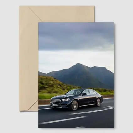 Mercedes E-Class Driving Through Mountain Road
