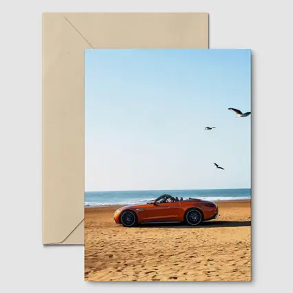 Mercedes SL Class Roadster On Sandy Beach