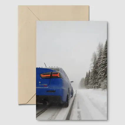 Mitsubishi Lancer Evolution Blue Winter Road