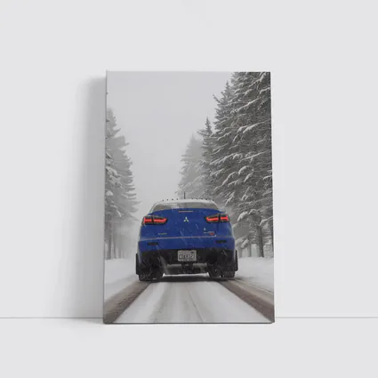 Mitsubishi Lancer Blue Driving Snowy Winter Road