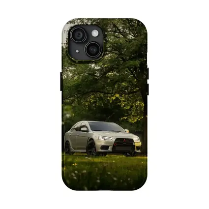 Mitsubishi Lancer Evolution Parked Under Green Trees