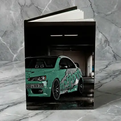 Mitsubishi Lancer Evo Teal Wrap Parking Garage