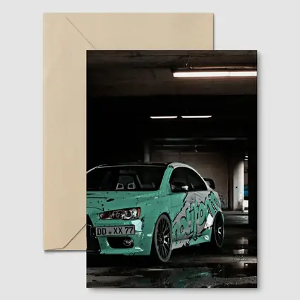 Mitsubishi Lancer Evo Teal Wrap Parking Garage