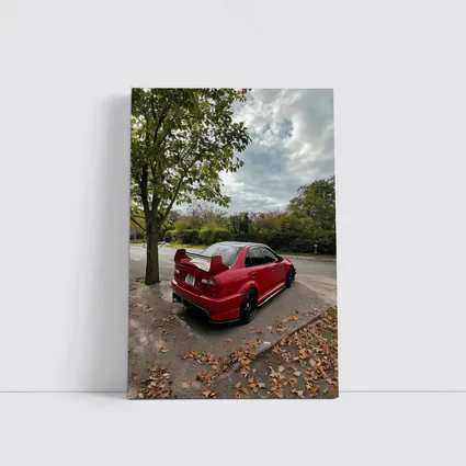 Red Mitsubishi Lancer Evolution Street Parking