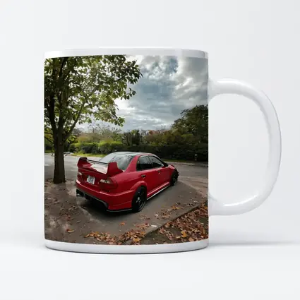 Red Mitsubishi Lancer Evolution Street Parking
