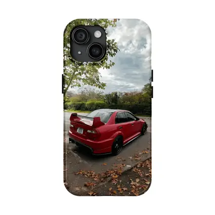 Red Mitsubishi Lancer Evolution Street Parking
