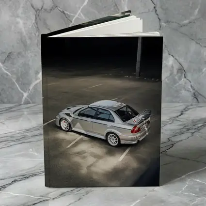 Mitsubishi Lancer Evolution Silver Parking Garage