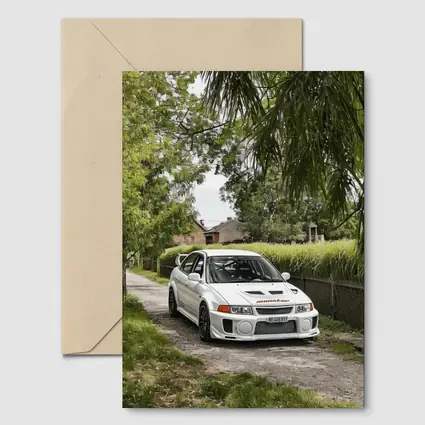 Mitsubishi Lancer Evolution White Gravel Road