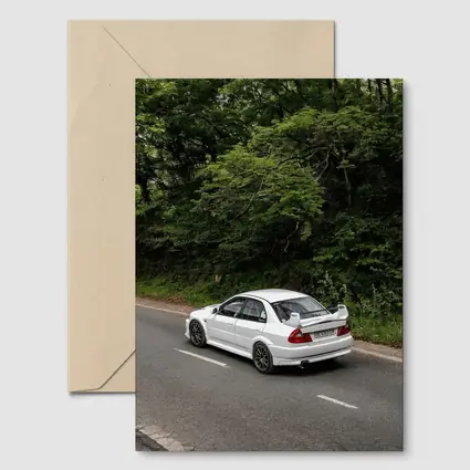 Mitsubishi Lancer Evolution White Road Drive
