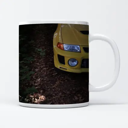 Yellow Mitsubishi Lancer Evolution Forest Trail