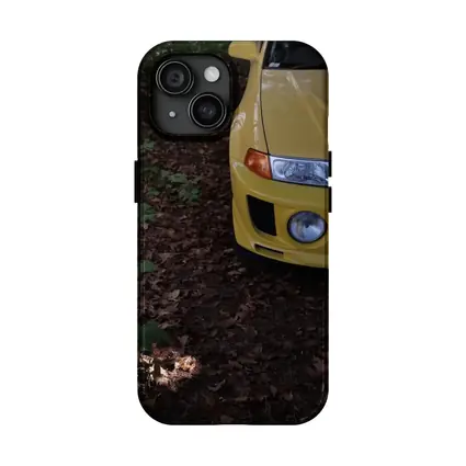 Yellow Mitsubishi Lancer Evolution Forest Trail