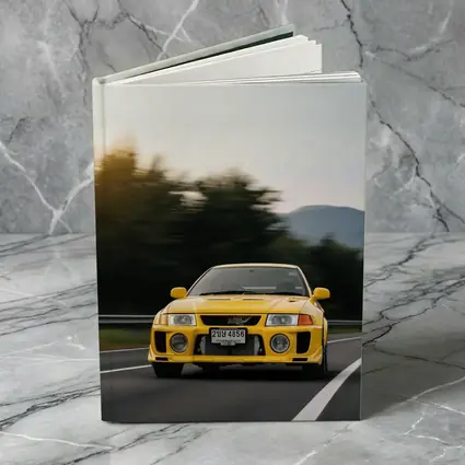 Yellow Mitsubishi Lancer Evolution On Mountain Road