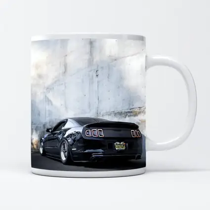 Black Ford Mustang Against Concrete Wall