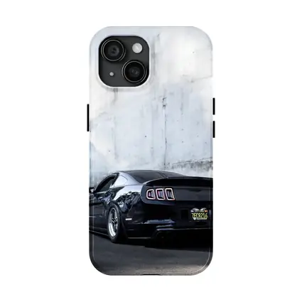 Black Ford Mustang Against Concrete Wall