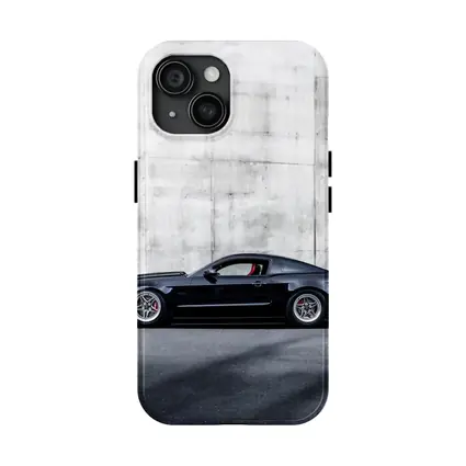 Black Ford Mustang Against Concrete Wall
