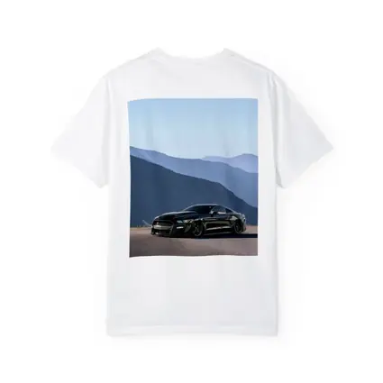 Black Ford Mustang Parked Against Mountain Backdrop