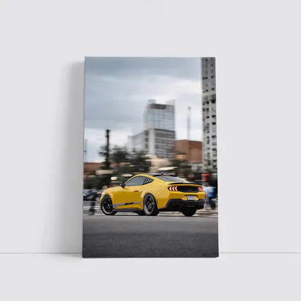 Yellow Ford Mustang Racing Through City Streets
