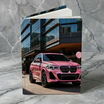 Pink BMW X5 Parked Outside Glass Building
