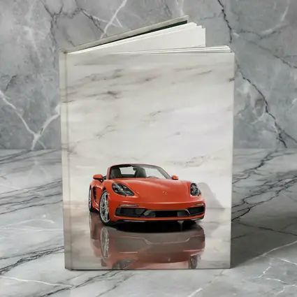 Porsche 718 Boxster Orange Marble Background