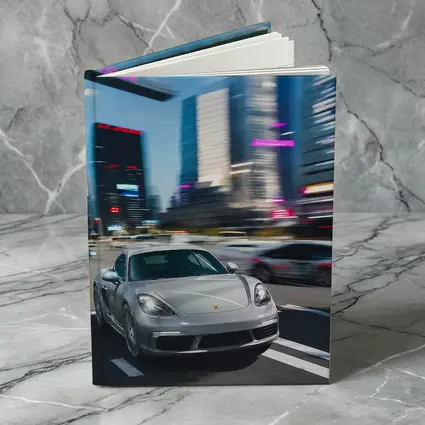 Porsche 718 Cayman Racing Through City Streets