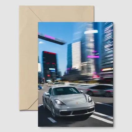 Porsche 718 Cayman Racing Through City Streets