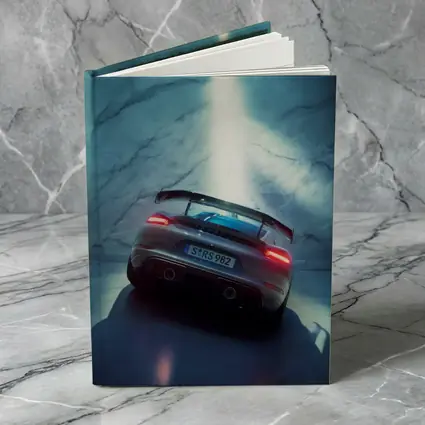 Porsche Cayman Rear View Marble Background