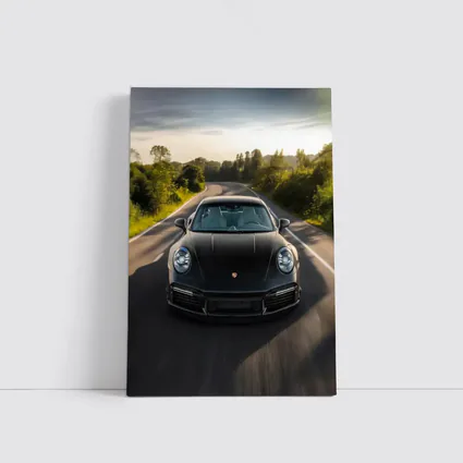 Black Porsche 911 Driving Open Road