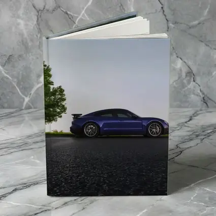 Porsche Taycan Blue Side Profile Road