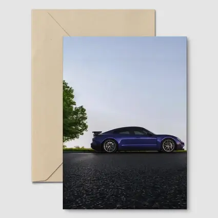 Porsche Taycan Blue Side Profile Road