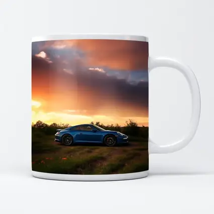 Blue Porsche 911 Parked at Dramatic Sunset