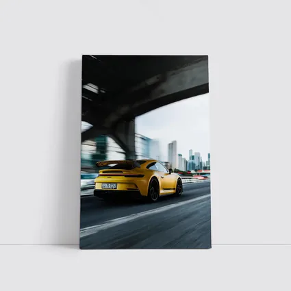 Yellow Porsche GT3 Racing Through City