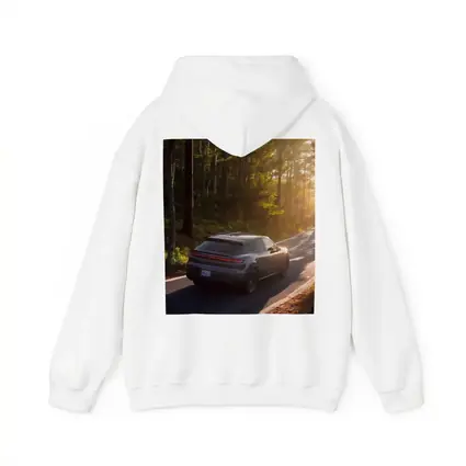 Porsche Macan Driving Through Sunlit Forest