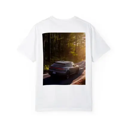 Porsche Macan Driving Through Sunlit Forest