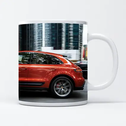 Porsche Macan S Orange City Skyscrapers