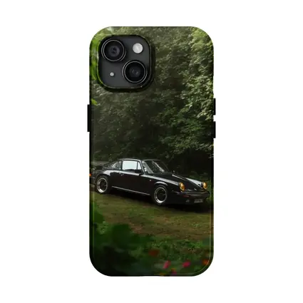 Black Porsche 911 Parked in Green Forest