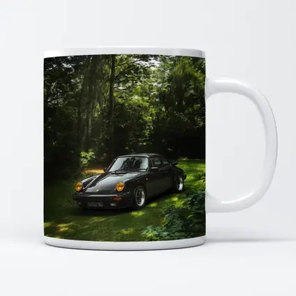 Black Porsche 911 Parked in Green Forest