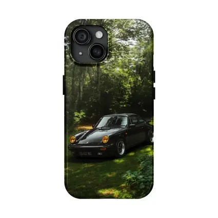 Black Porsche 911 Parked in Green Forest