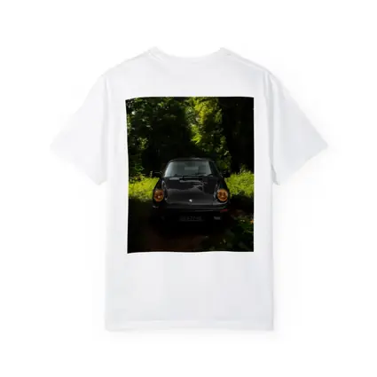 Black Porsche 911 Parked in Green Forest