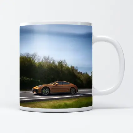 Porsche Panamera Orange on Open Road
