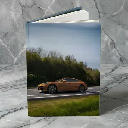 Porsche Panamera Orange on Open Road