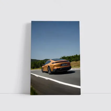 Porsche Panamera Orange On Open Road